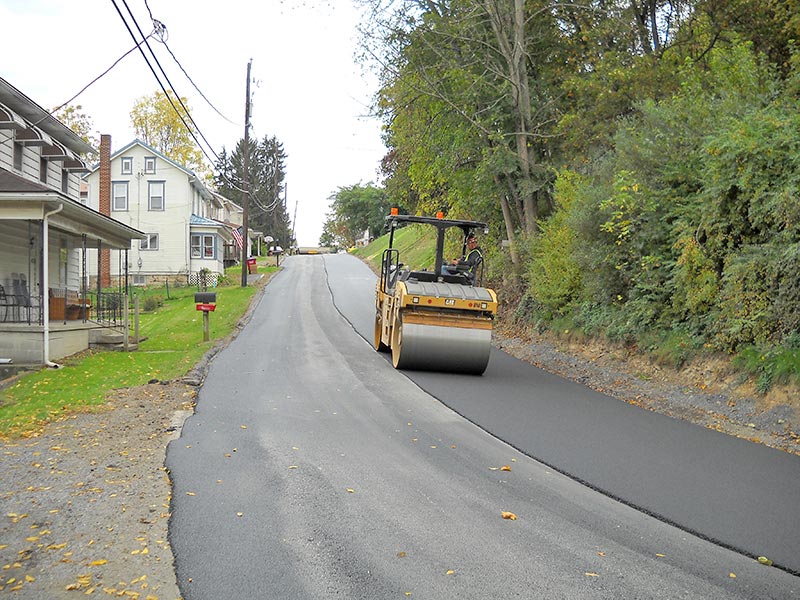 Rolling newly paved street